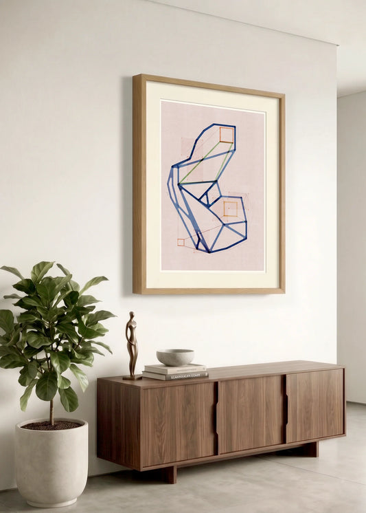 Framed geometric abstract print m105 by Jesús Perea hanging on a white wall in a modern, minimalist living room