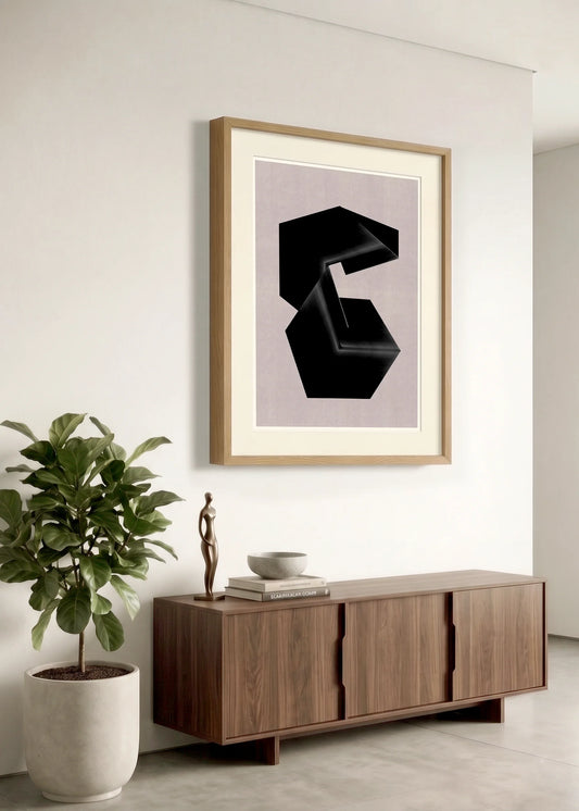 Framed geometric abstract print m217 by Jesús Perea hanging on a white wall in a modern, minimalist living room