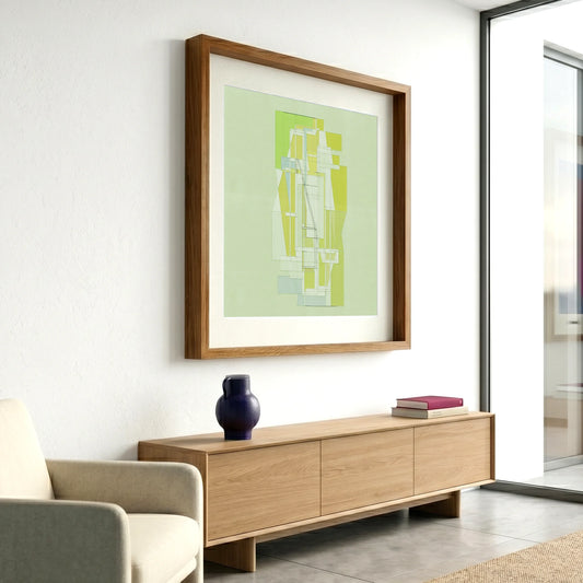 Framed geometric abstract print M47 by Jesús Perea hanging on a white wall in a modern, minimalist living room