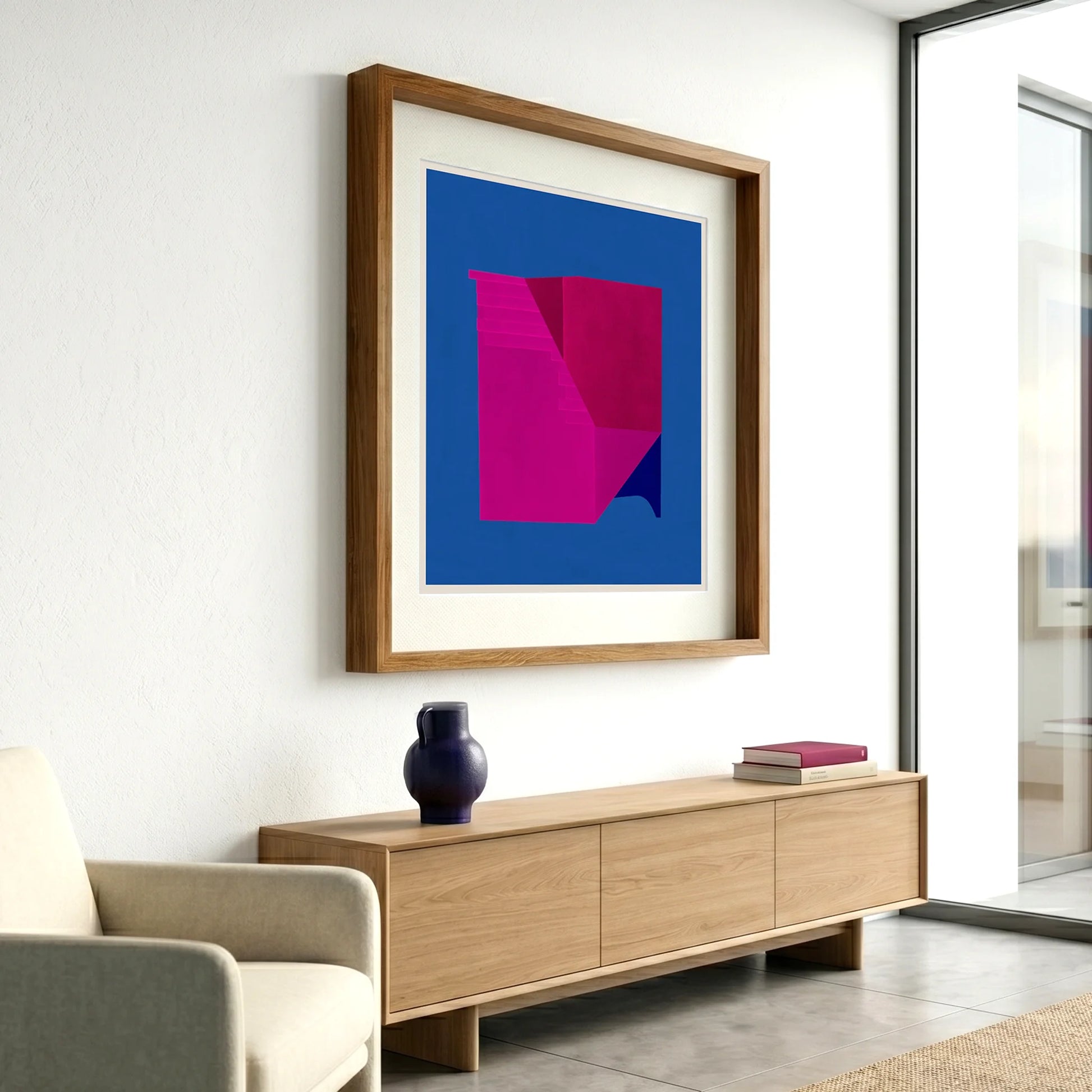 Framed geometric abstract print 495 by Jesús Perea hanging on a white wall in a modern, minimalist living room
