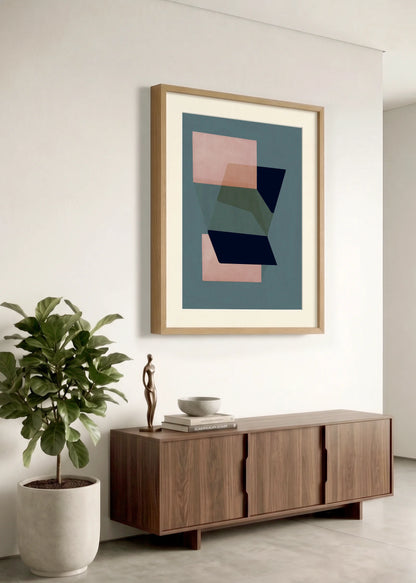 Framed geometric abstract print 520 by Jesús Perea hanging on a white wall in a modern, minimalist living room