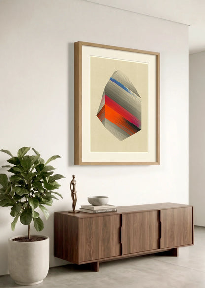 Framed geometric abstract print m167 by Jesús Perea hanging on a white wall in a modern, minimalist living room