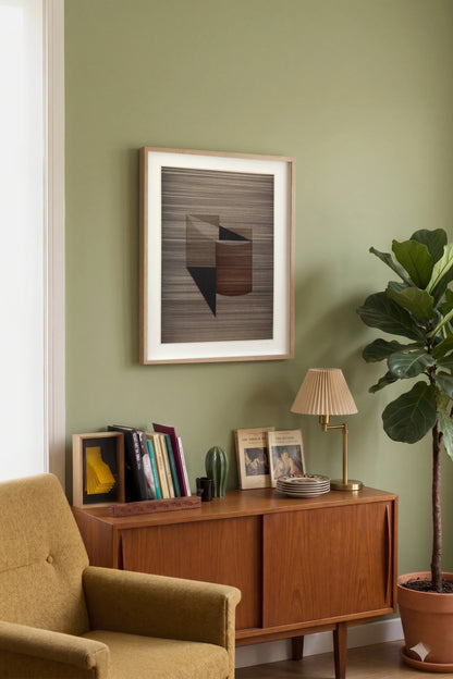 Original abstract mixed media artwork NS9 by Jesús Perea with horizontal lines in browns and black, hunging on a living room wall