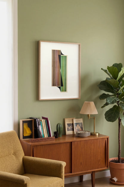 Original abstract mixed media artwork NS15 by Jesús Perea featuring a composition with colorful lines and black shapes on a light beige background, hunging on a living room wall